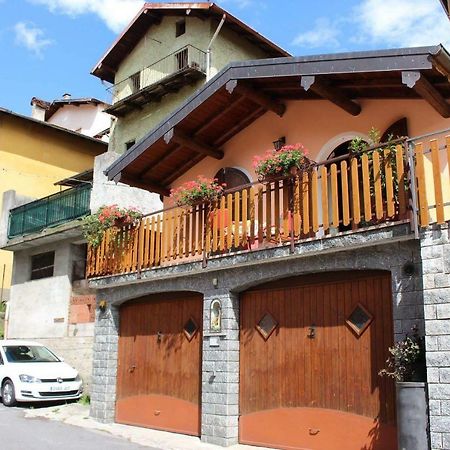 Chalet Con Piscina Garzeno Bagian luar foto