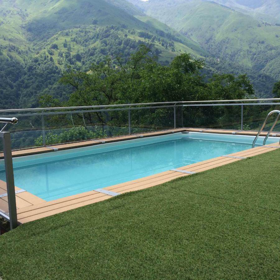 Chalet Con Piscina Garzeno Bagian luar foto
