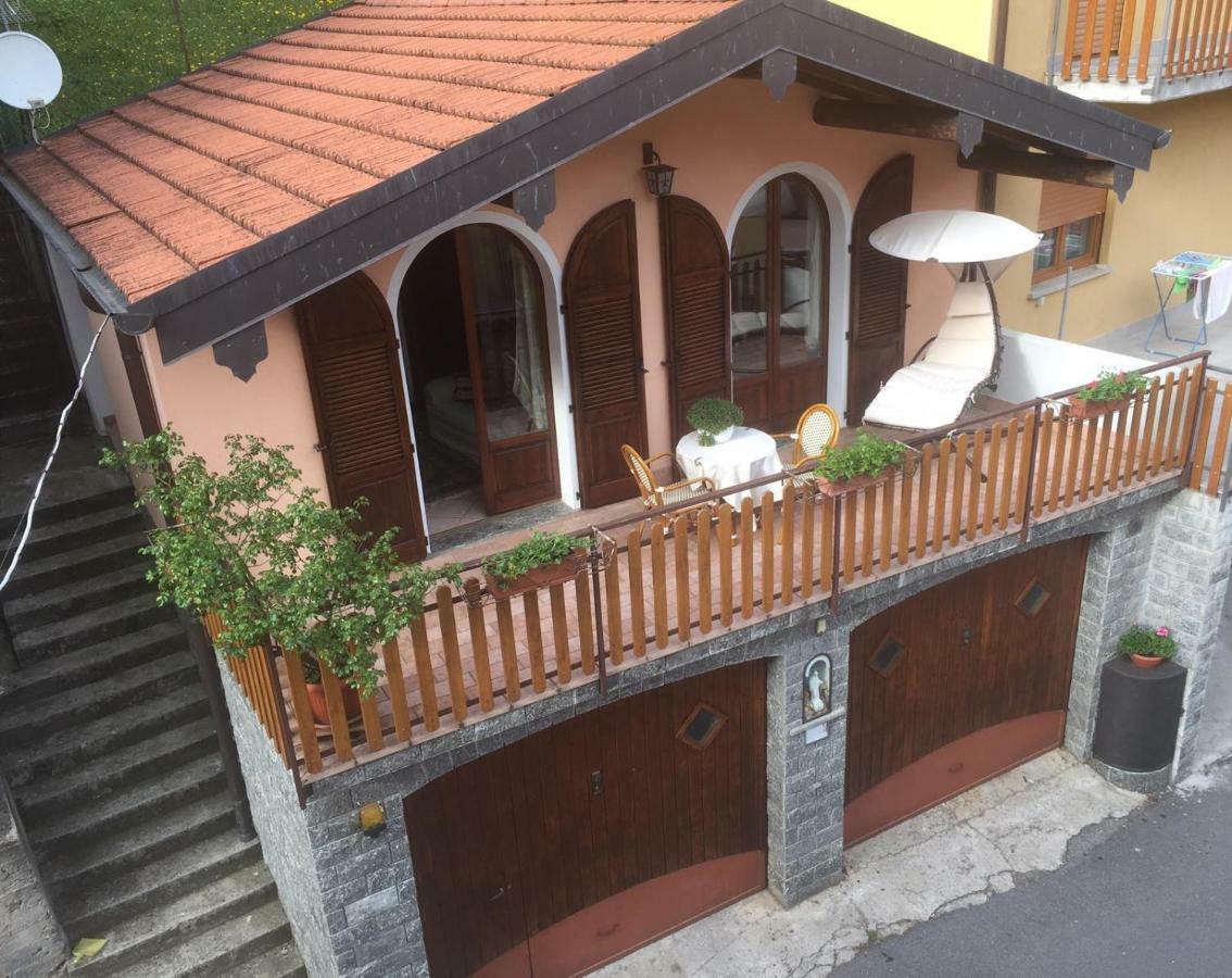 Chalet Con Piscina Garzeno Bagian luar foto