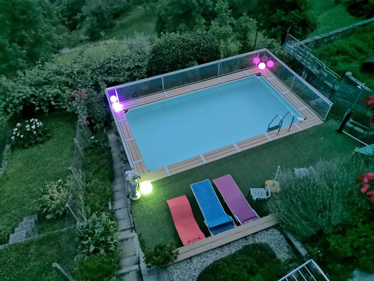 Chalet Con Piscina Garzeno Bagian luar foto